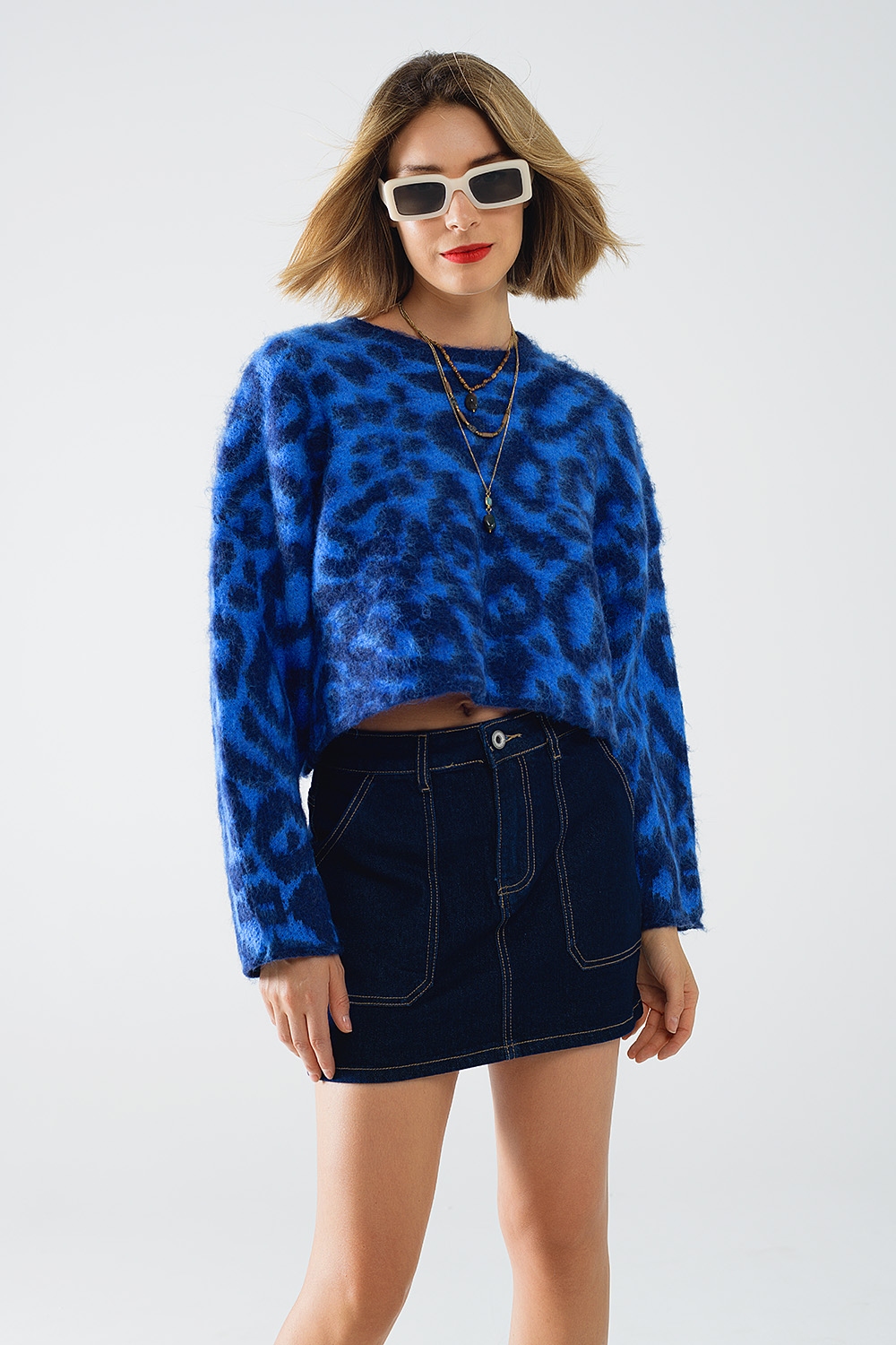 Jersey azul con estampado de leopardo de punto con lana Jersey azul con estampado de leopardo de punto con lana