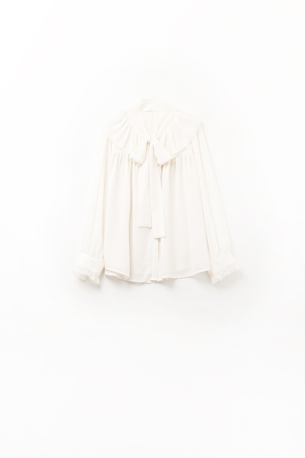 Camisa de gasa beige con detalle de lazo