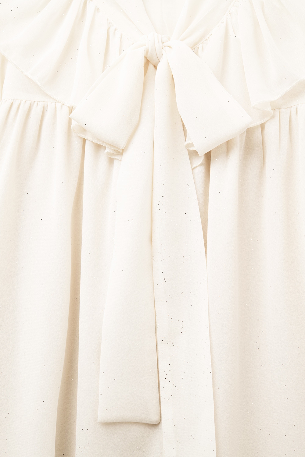 Camisa de gasa beige con detalle de lazo