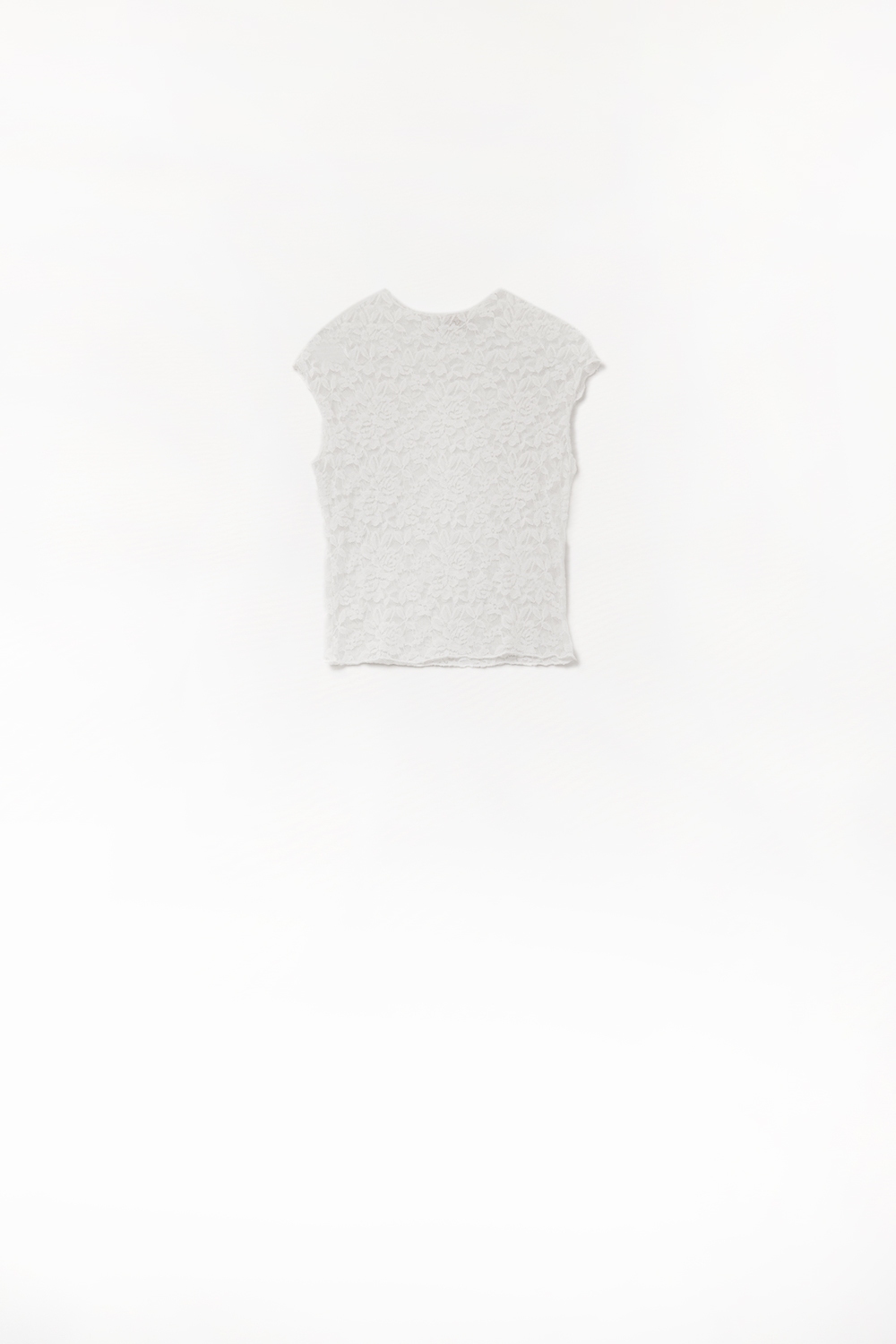 Camiseta rom&aacute;ntica de encaje sin mangas en blanco