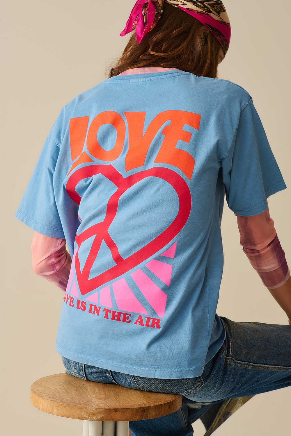 Camiseta azul made in italy con logo Love is Air y Coraz&oacute;n con Paz