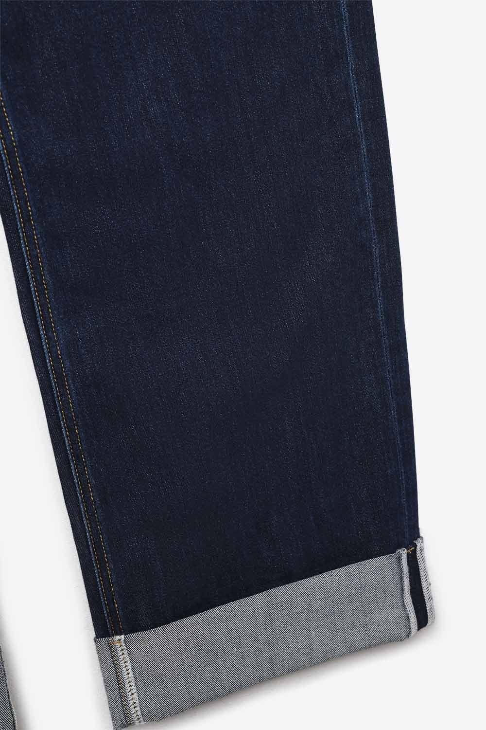 Vaqueros de talle alto y pernera ancha en azul oscuro con dobladillo plegado Vaqueros de talle alto y pernera ancha en azul oscuro con dobladillo plegado
