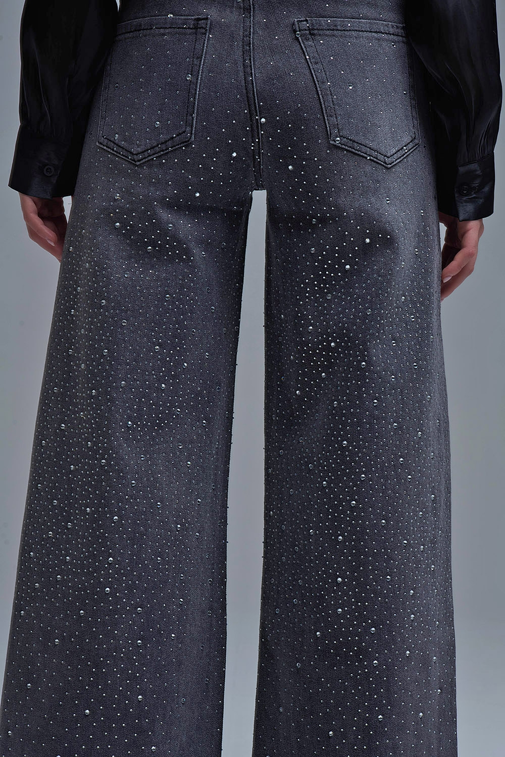Vaqueros negros de pata ancha con strass Vaqueros negros de pata ancha con strass
