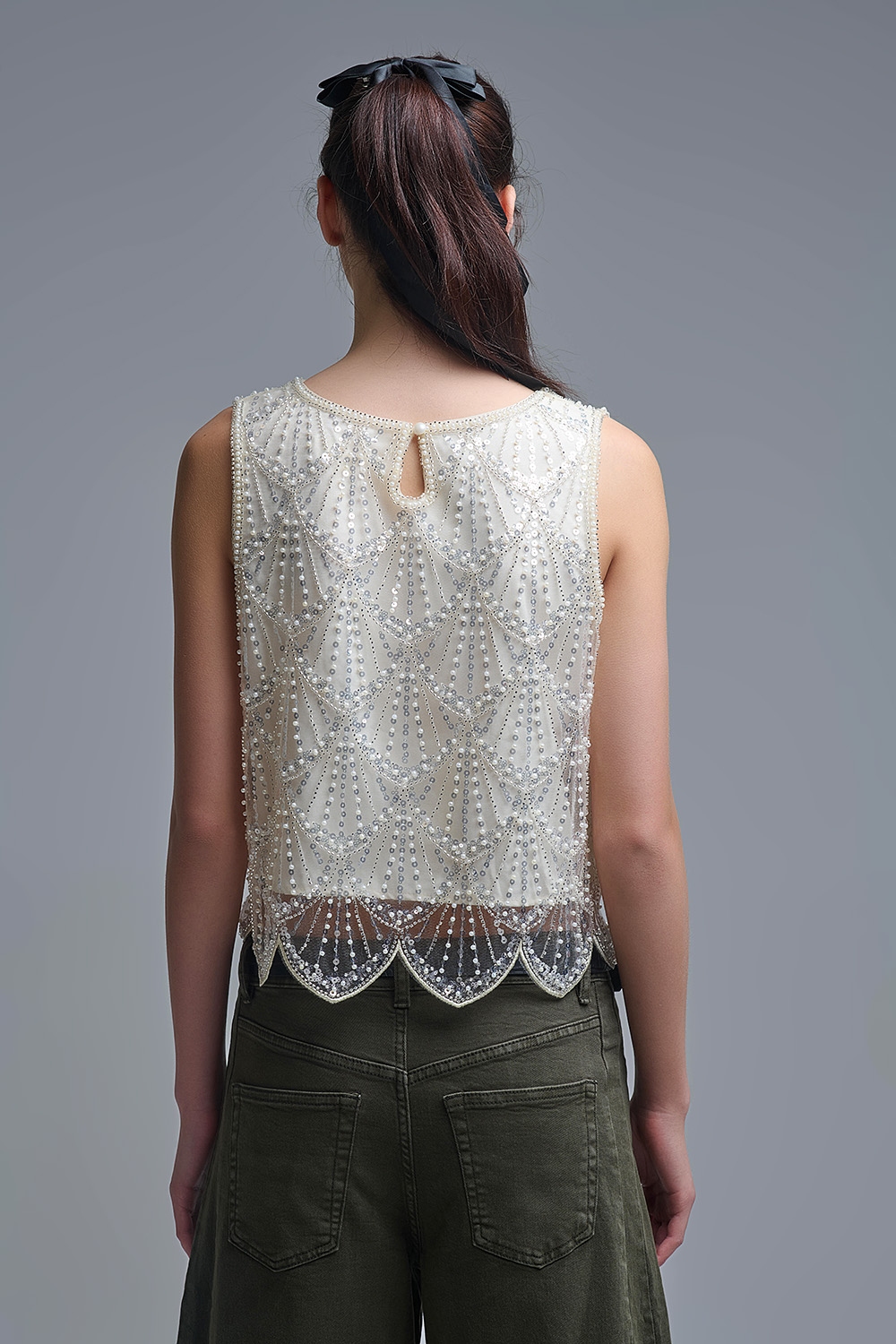 Top de lentejuelas en color crema Top de lentejuelas en color crema