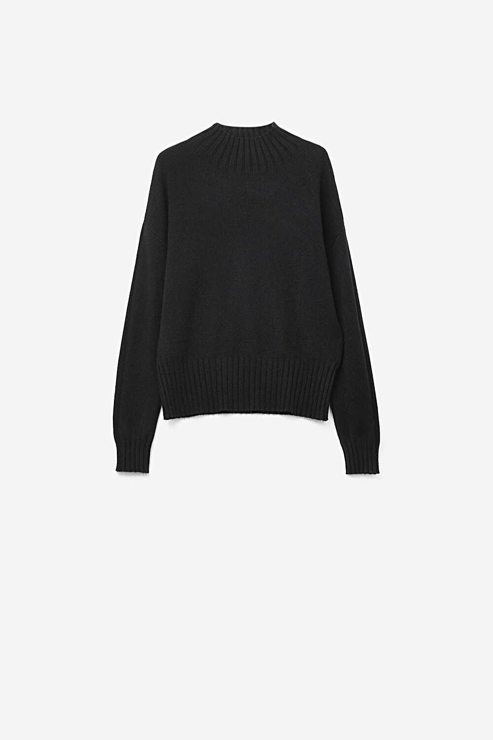 Jersey negro de punto suave con pu&ntilde;os y cuello de canal&eacute;