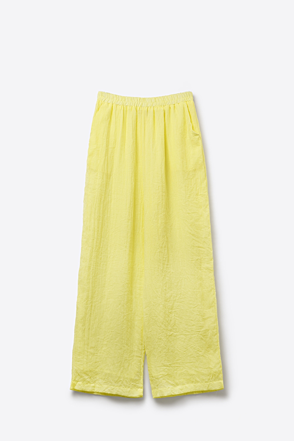 Pantalones amarillos de pierna ancha con tela transparente Pantalones amarillos de pierna ancha con tela transparente