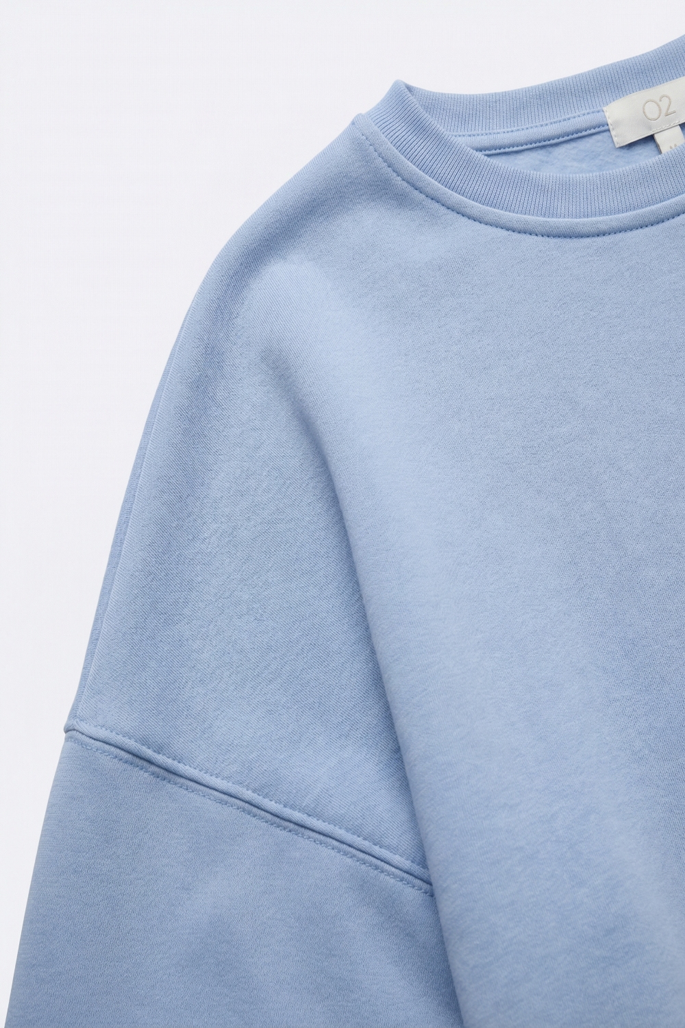 Sudadera básica con cuello redondo y hombros caídos en azul Sudadera básica con cuello redondo y hombros caídos en azul