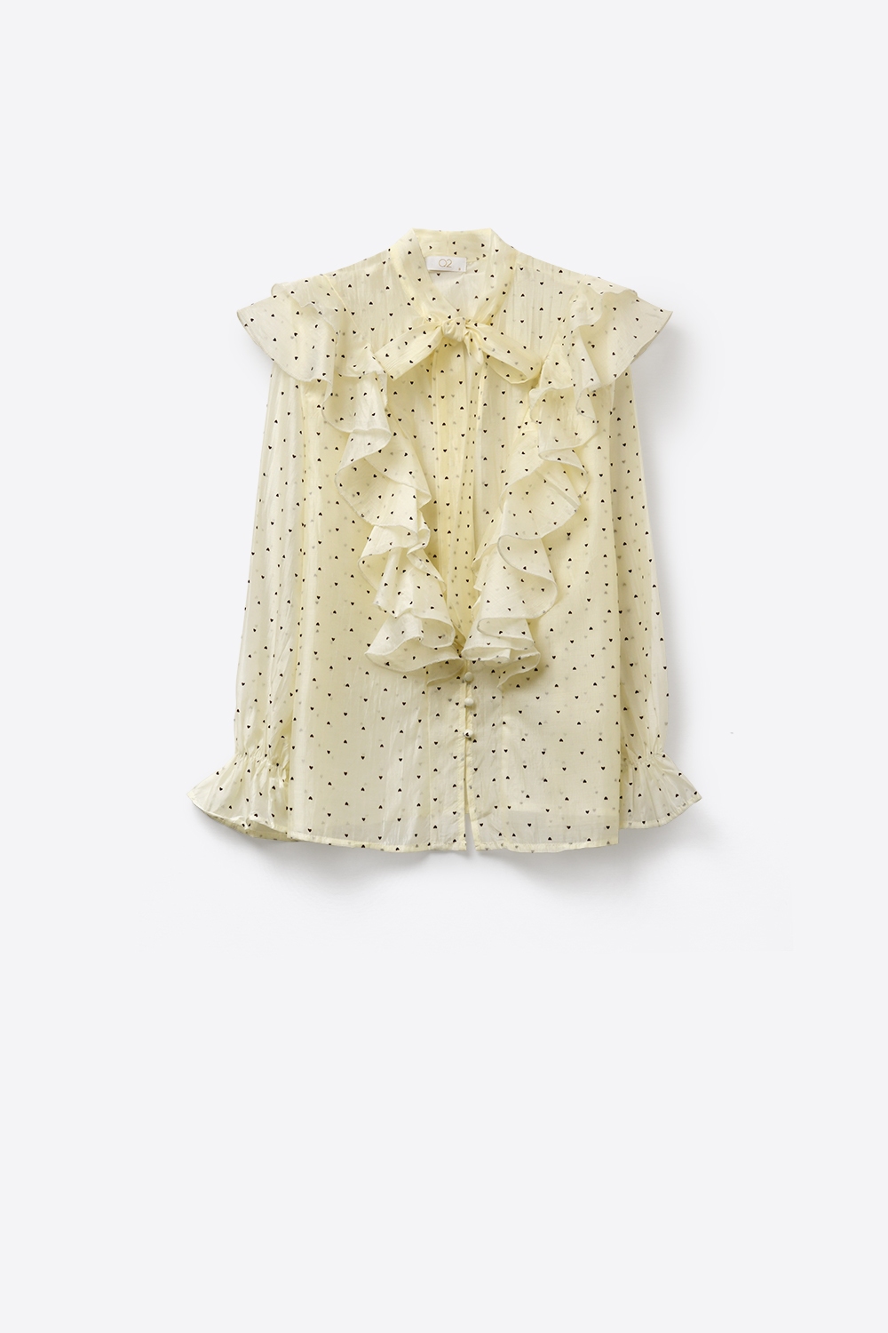Blusa con volantes y pu&ntilde;os de lunares en color crema