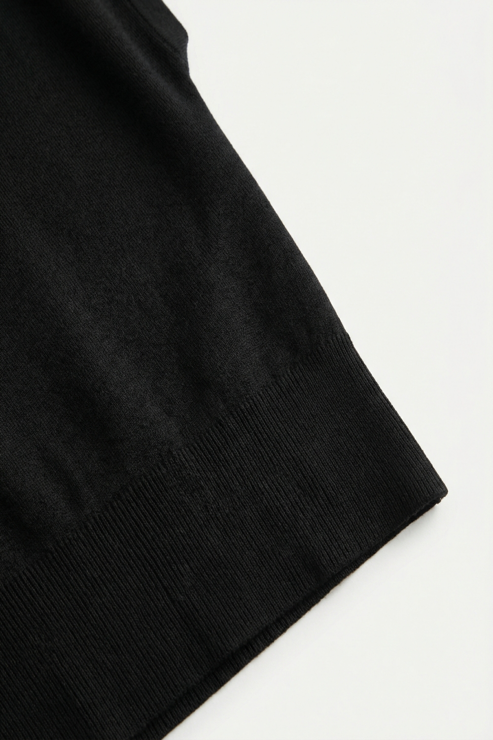 Suéter de punto ligero con cintura ancha acanalada en negro Suéter de punto ligero con cintura ancha acanalada en negro