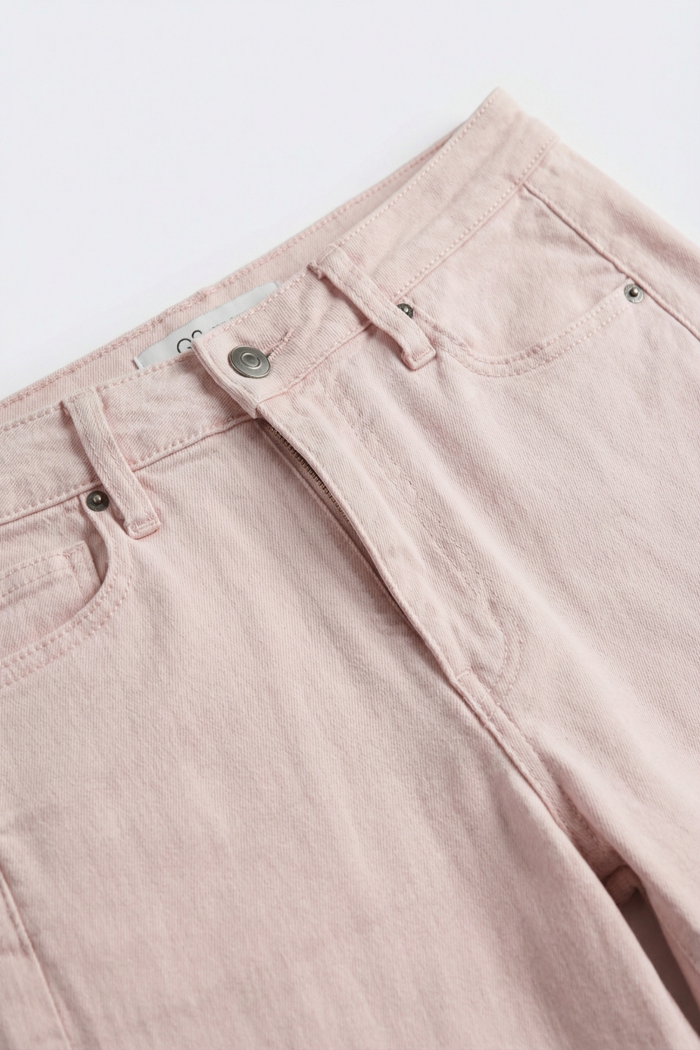 Pantalones anchos de color rosa claro con sarga ligera Pantalones anchos de color rosa claro con sarga ligera