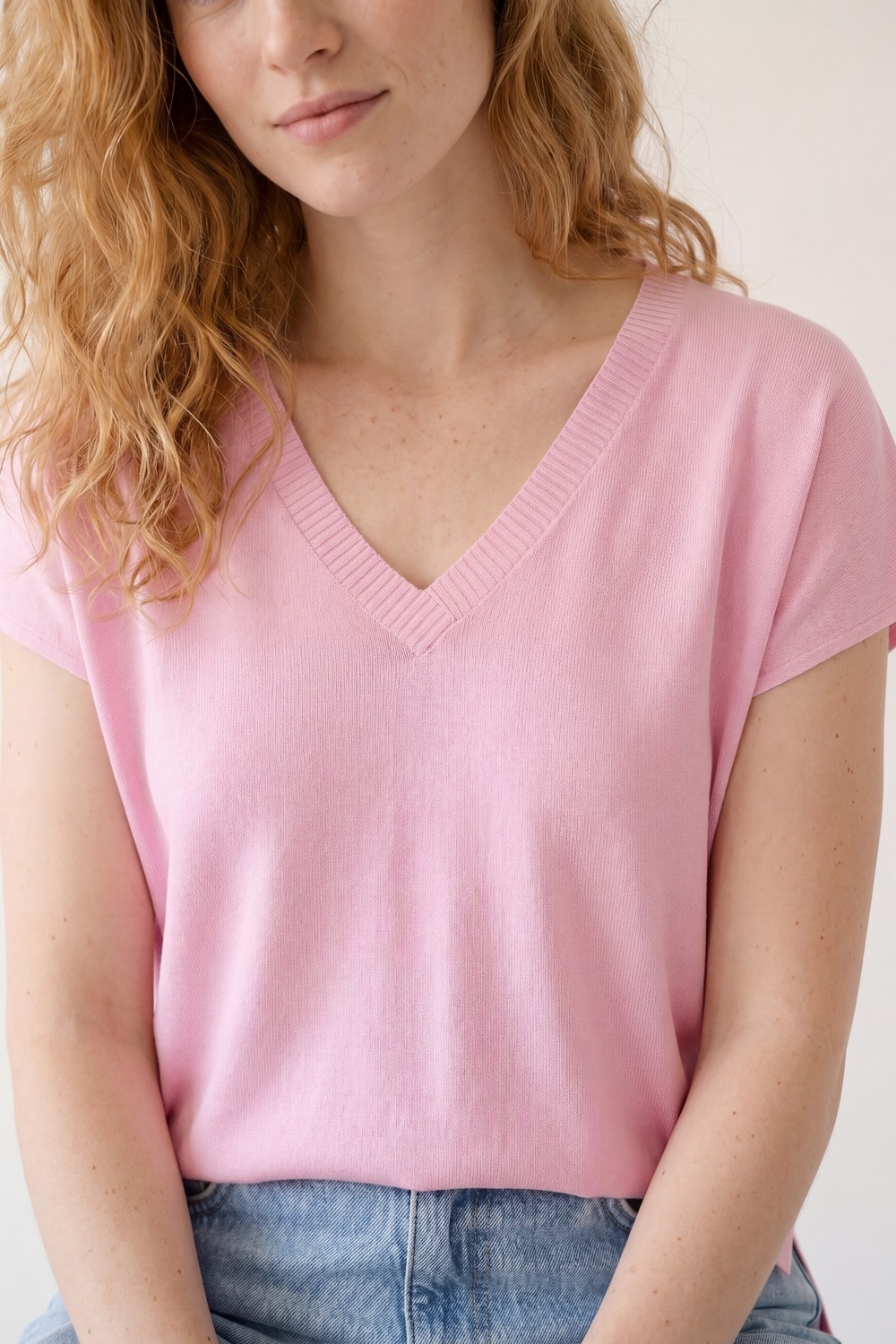 Jersey de punto rosa de corte relajado y cuello en V