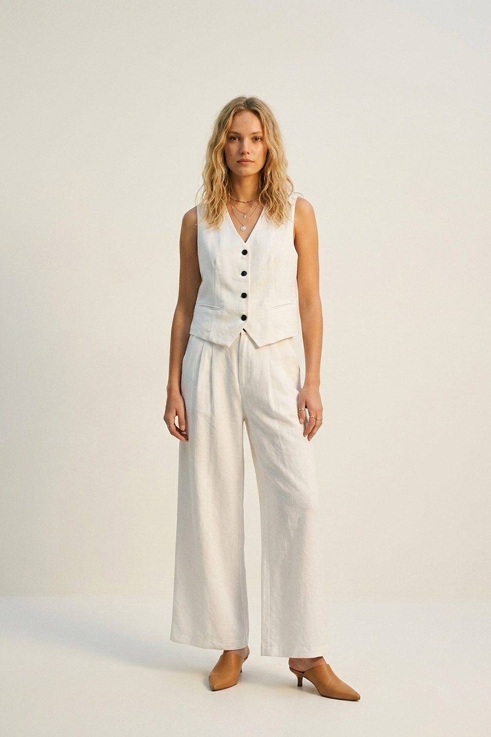 Pantalones Blancos de Pierna Ancha con Pliegues Frontales para el Verano