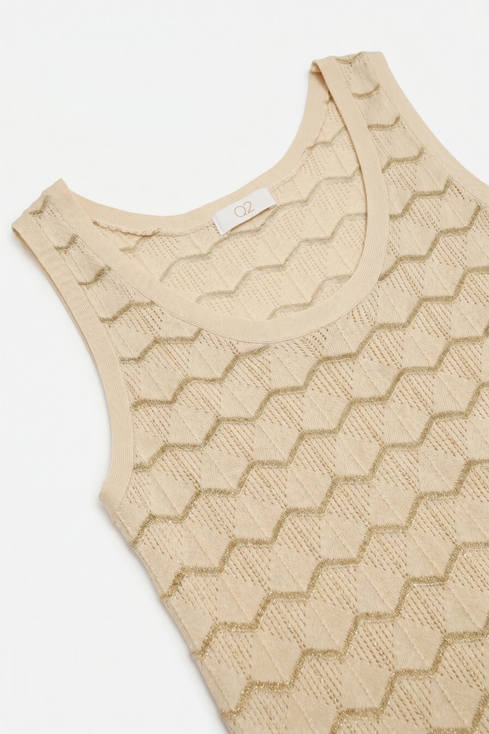 Top sin mangas de punto texturizado geom&eacute;trico beige
