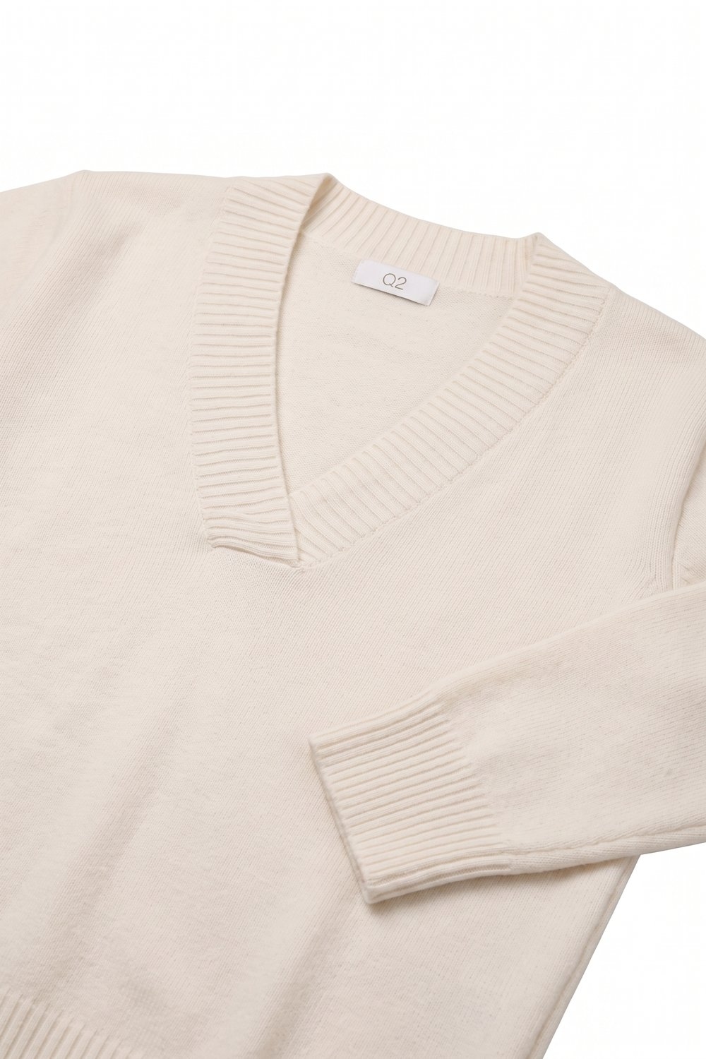 Jersey blanco c&aacute;lido de punto con escote en V ancho