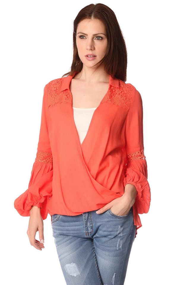 Orange blouse with wrap front and draped detail