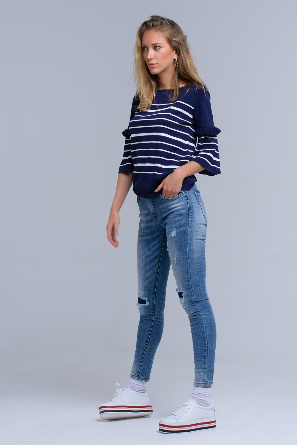 Jeans ajustados con rasgaduras Jeans ajustados con rasgaduras