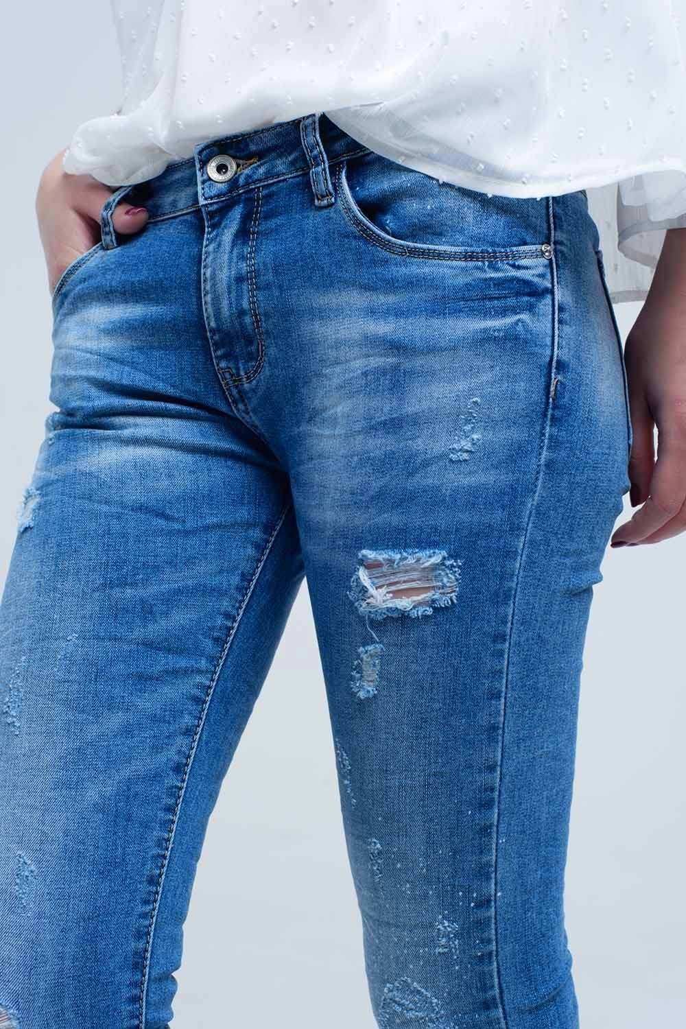 Jeans ajustados de tiro medio con roturas Jeans ajustados de tiro medio con roturas