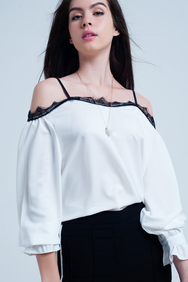 Top con pizzo nero e spalle nude bianco