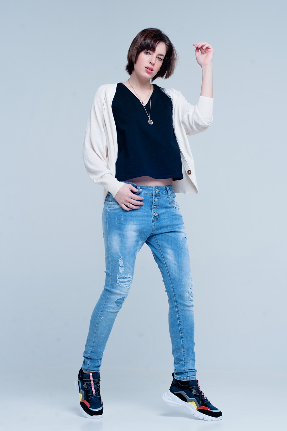 Vaqueros boyfriend rasgados con botones Vaqueros boyfriend rasgados con botones