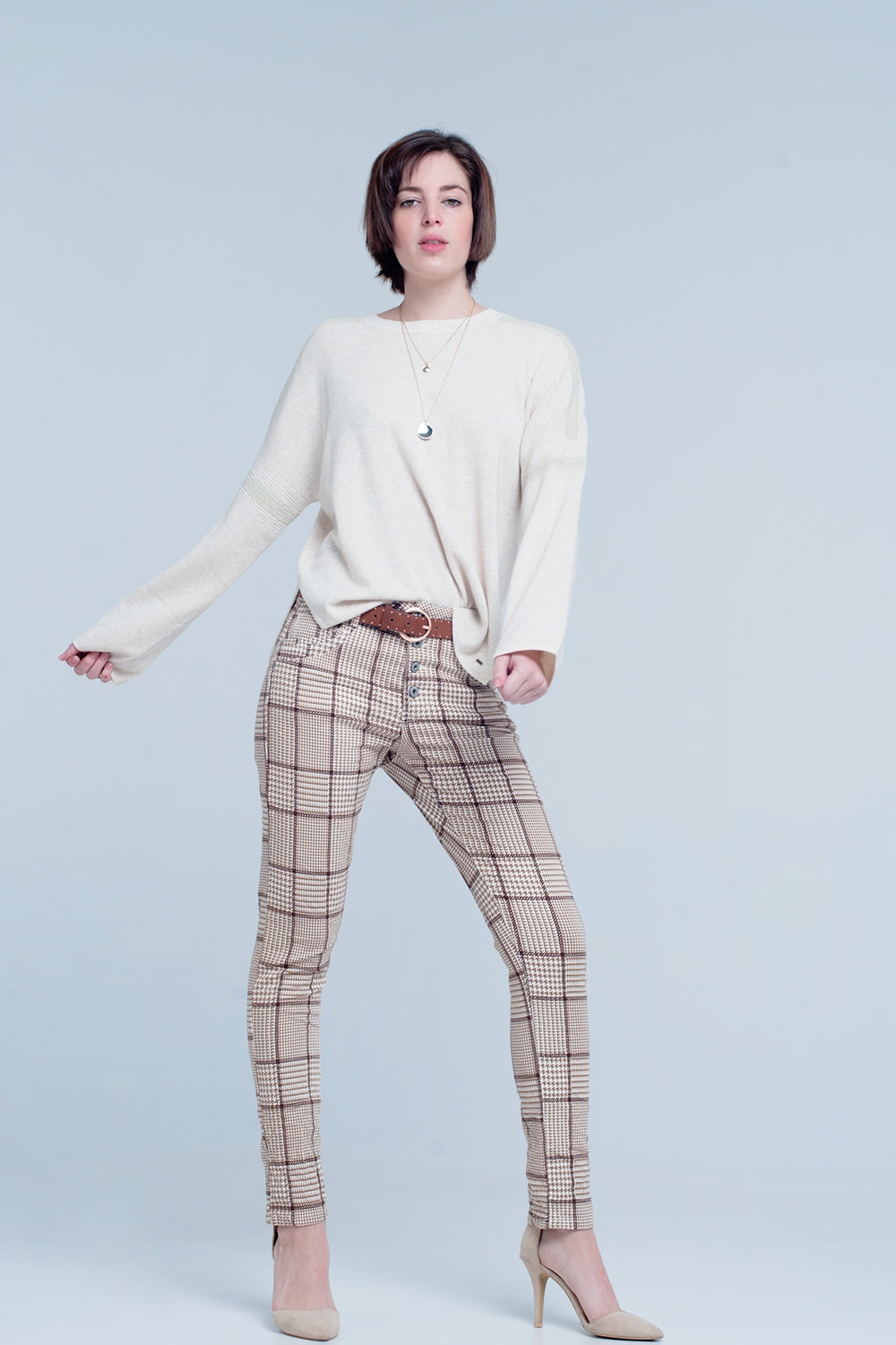 Pantalon de cuadros en beige con botones Pantalon de cuadros en beige con botones