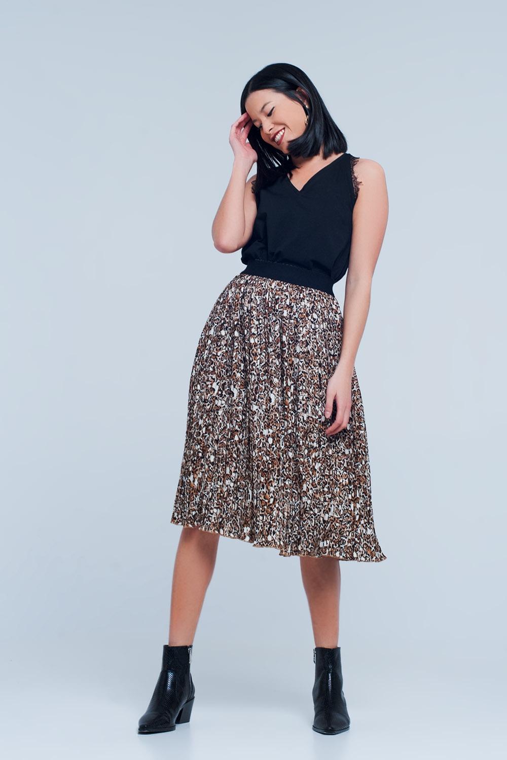 Falda midi plisada con diseño de leopardo Falda midi plisada con diseño de leopardo