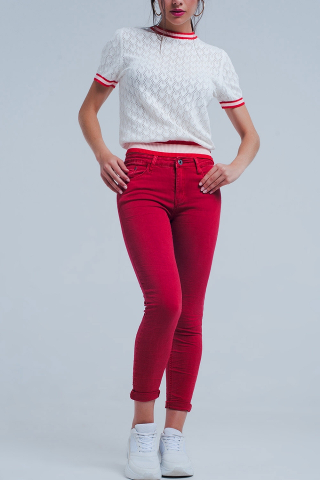 Red mid rise skinny jeans
