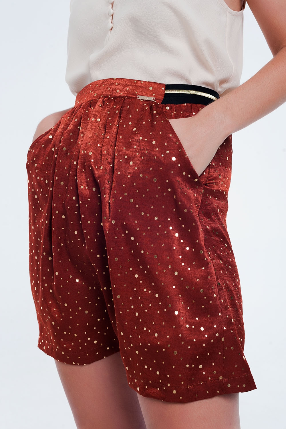 Minifalda caldera con pliegues y estampado de lunares Minifalda caldera con pliegues y estampado de lunares