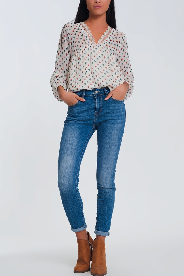 Jeans skinny azul claro com meia cintura