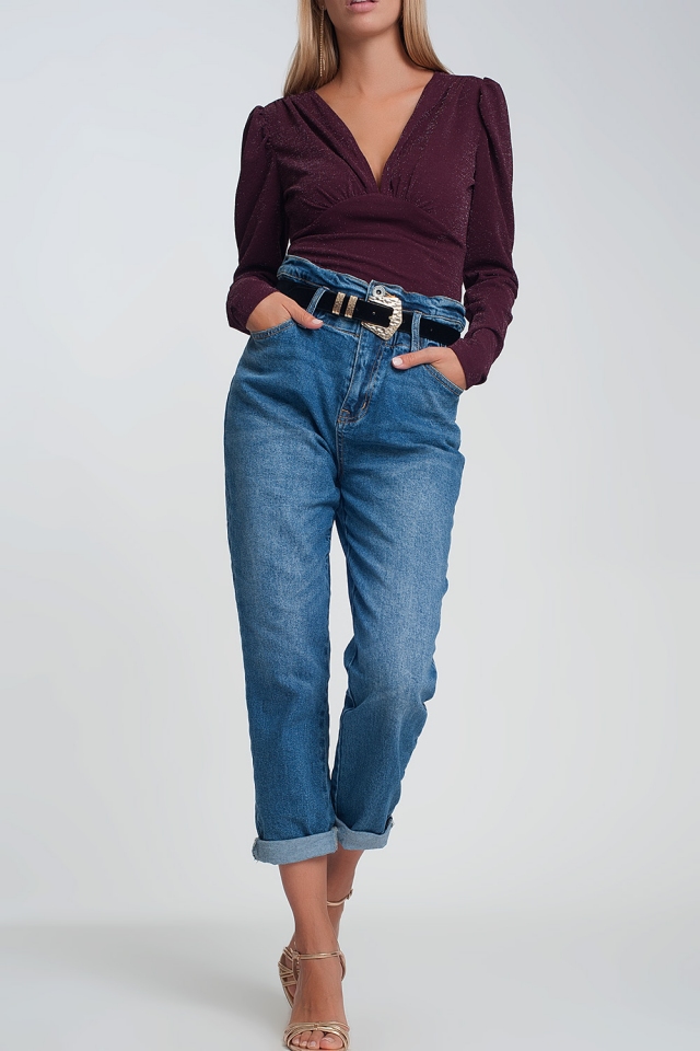 high waisted jeans in denim color