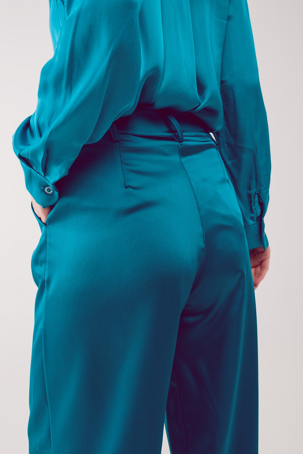 Pantalones palazzo con pinzas en turquesa Pantalones palazzo con pinzas en turquesa