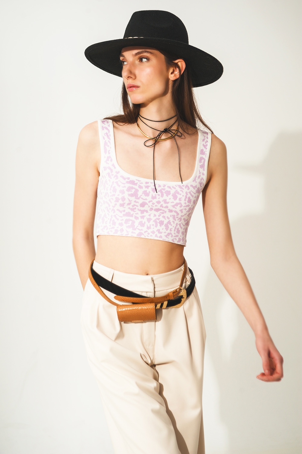 Top punto ligero en estampado animal lila