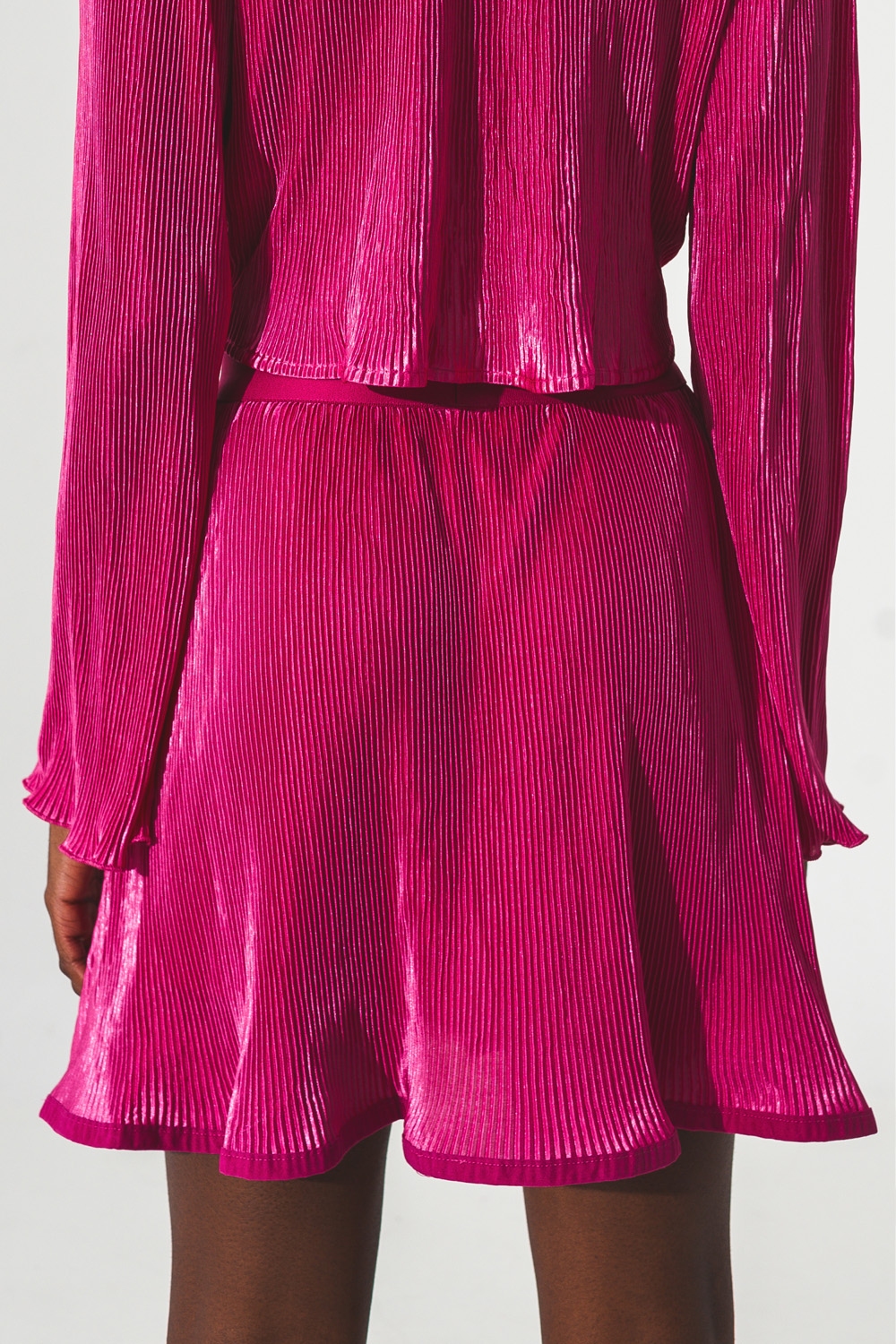 Falda corta plisada en Fucsia Falda corta plisada en Fucsia