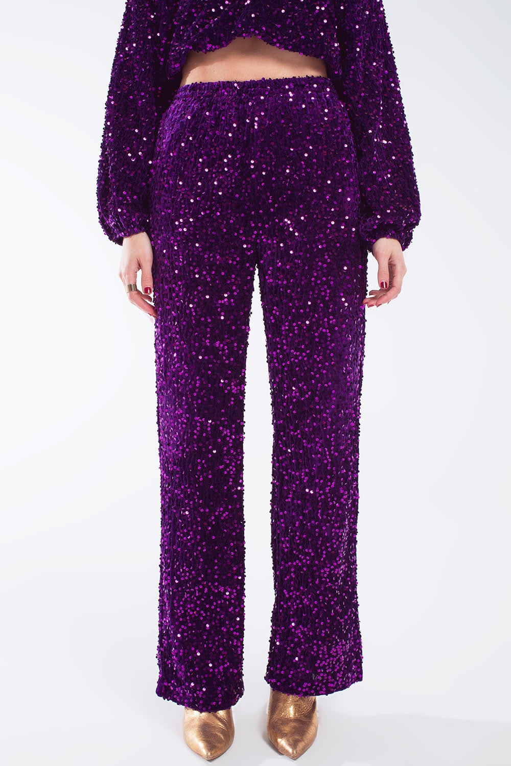 Pantalones anchos de lentejuelas con bolsillos laterales en morado