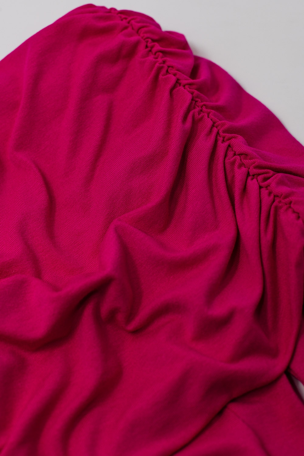 Top sin hombros en fucsia Top sin hombros en fucsia