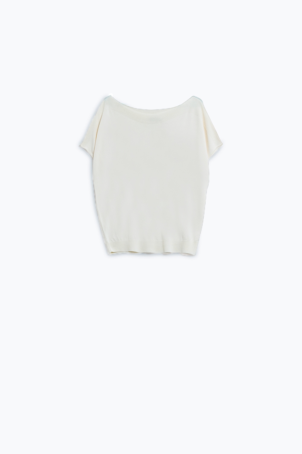 Jersey relajado sin hombros en color crema