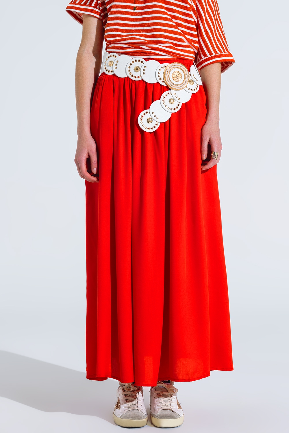 Maxifalda en tejido fluido rojo con cintura elástica Maxifalda en tejido fluido rojo con cintura elástica
