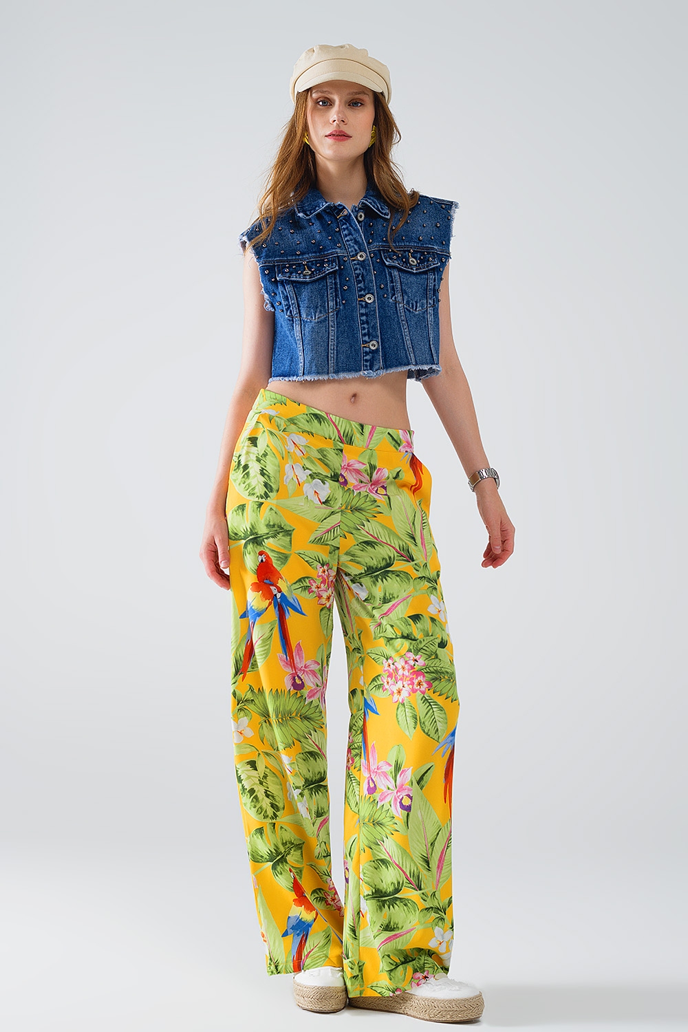 Pantal&oacute;n amarillo con estampado tropical y cremallera lateral