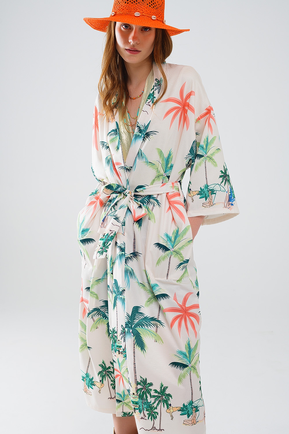 Kimono abierto en color crema con estampado playero y largo midi