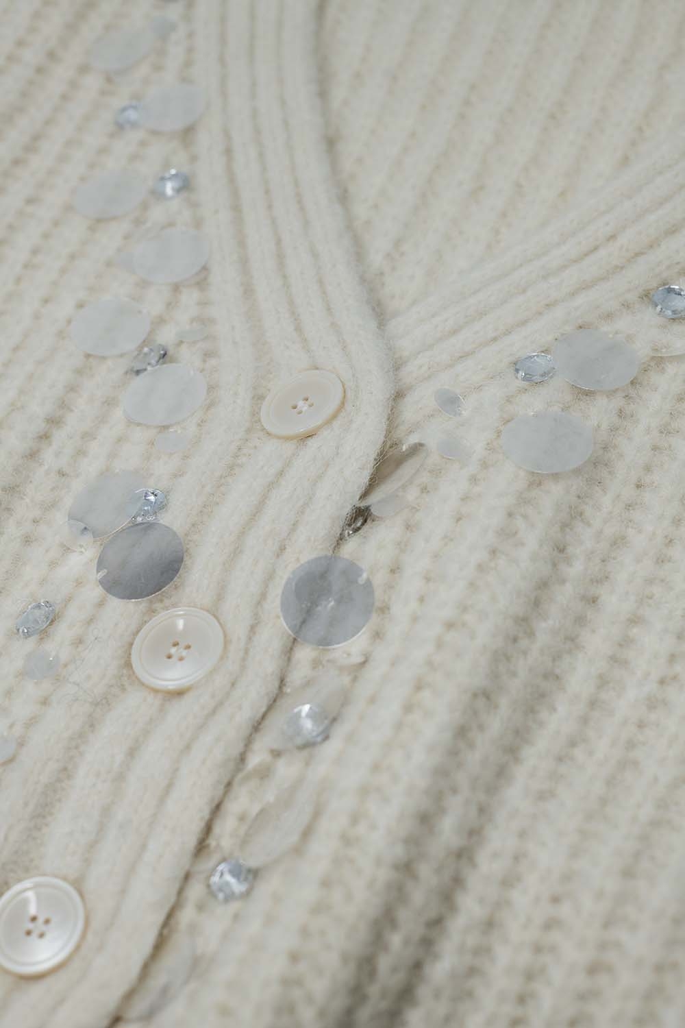 Chaqueta de punto grueso con detalle de lentejuelas Chaqueta de punto grueso con detalle de lentejuelas
