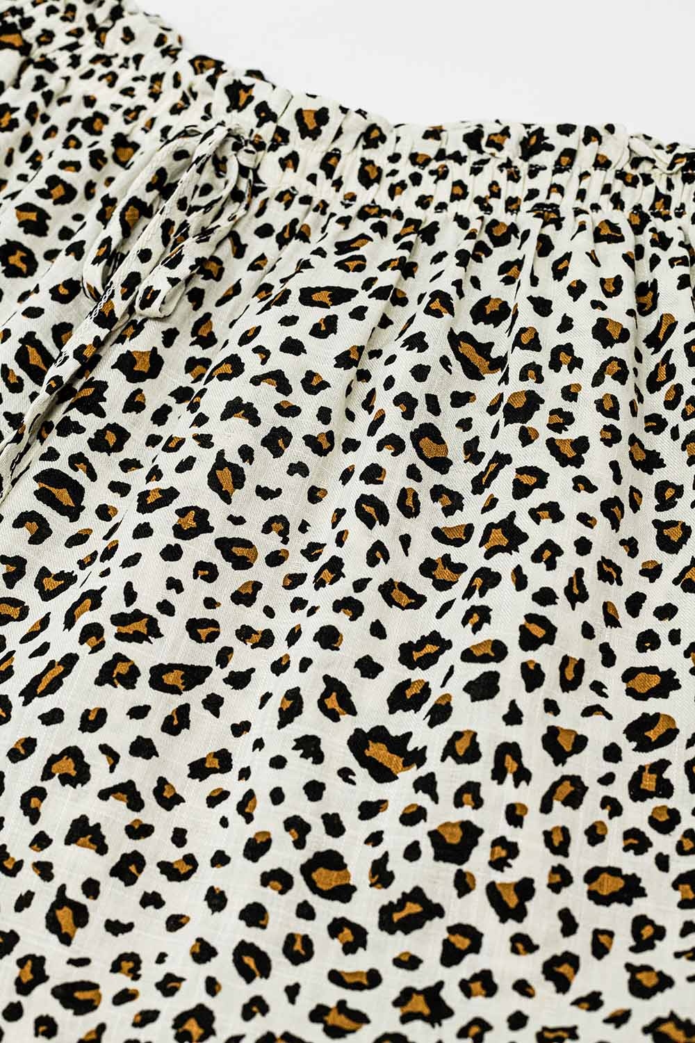 Pantalón recto con cintura elástica y estampado de leopardo Pantalón recto con cintura elástica y estampado de leopardo