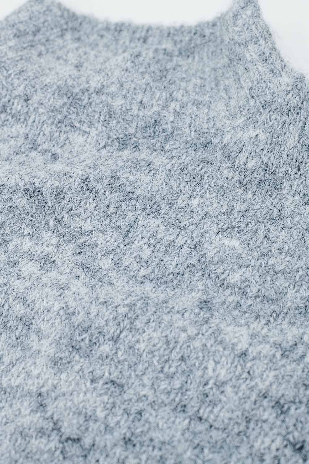 Jersey gris esponjoso con cuello alto y mangas globo Jersey gris esponjoso con cuello alto y mangas globo