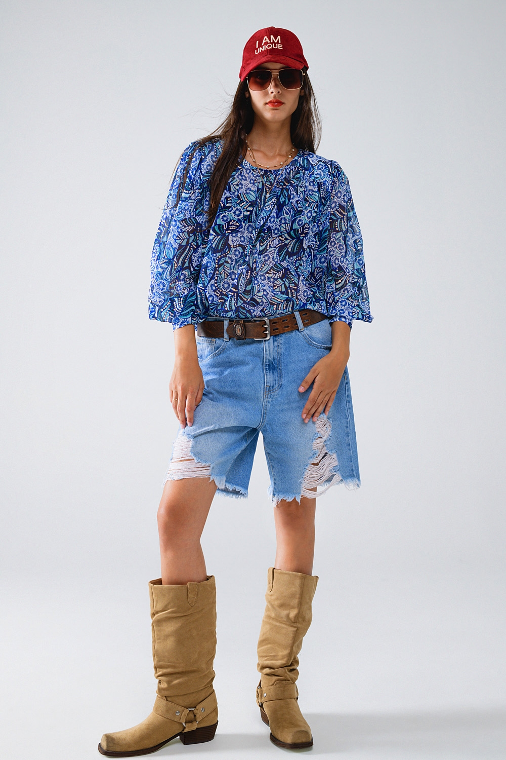 Blusa con estampado abstracto y mangas globo en azul Blusa con estampado abstracto y mangas globo en azul